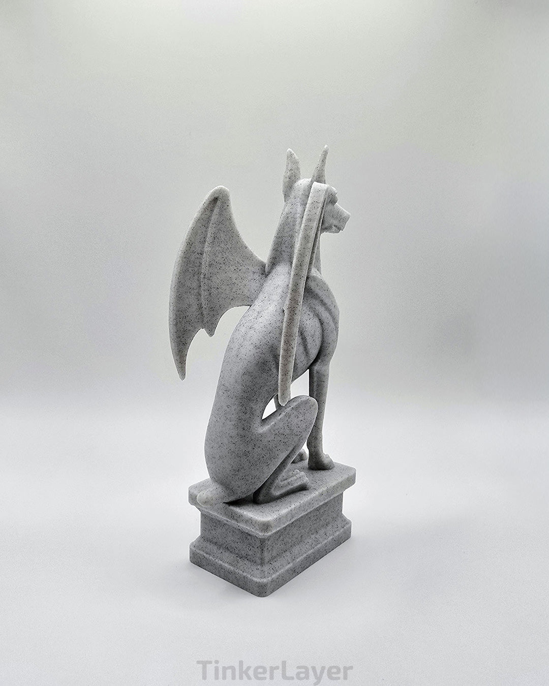 Rear view of a gothic Doberman gargoyle statue printed in marble PLA