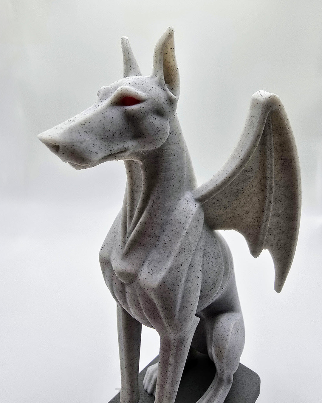 Side view of a gothic Doberman gargoyle statue printed in multicolor PLA