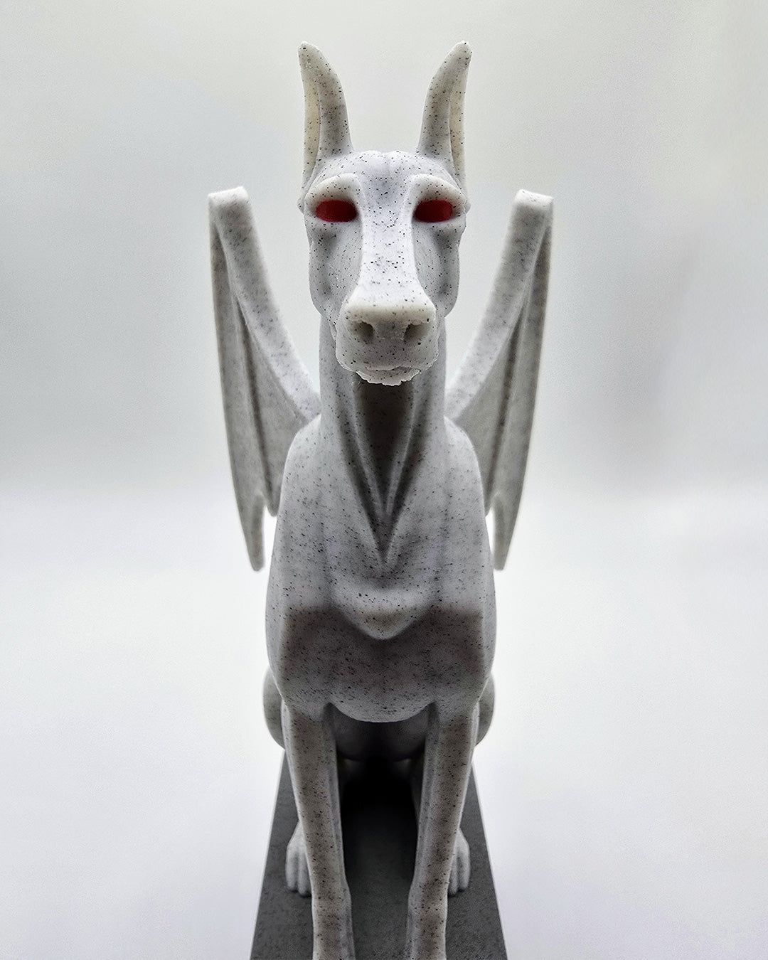 Front view of a gothic Doberman gargoyle statue printed in multicolor PLA