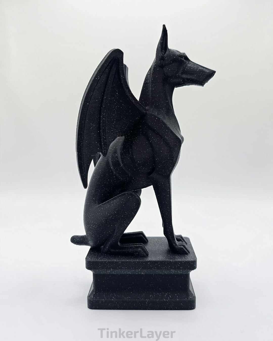 Side view of a gothic Doberman gargoyle statue printed in black and gray shimmer gradient PLA
