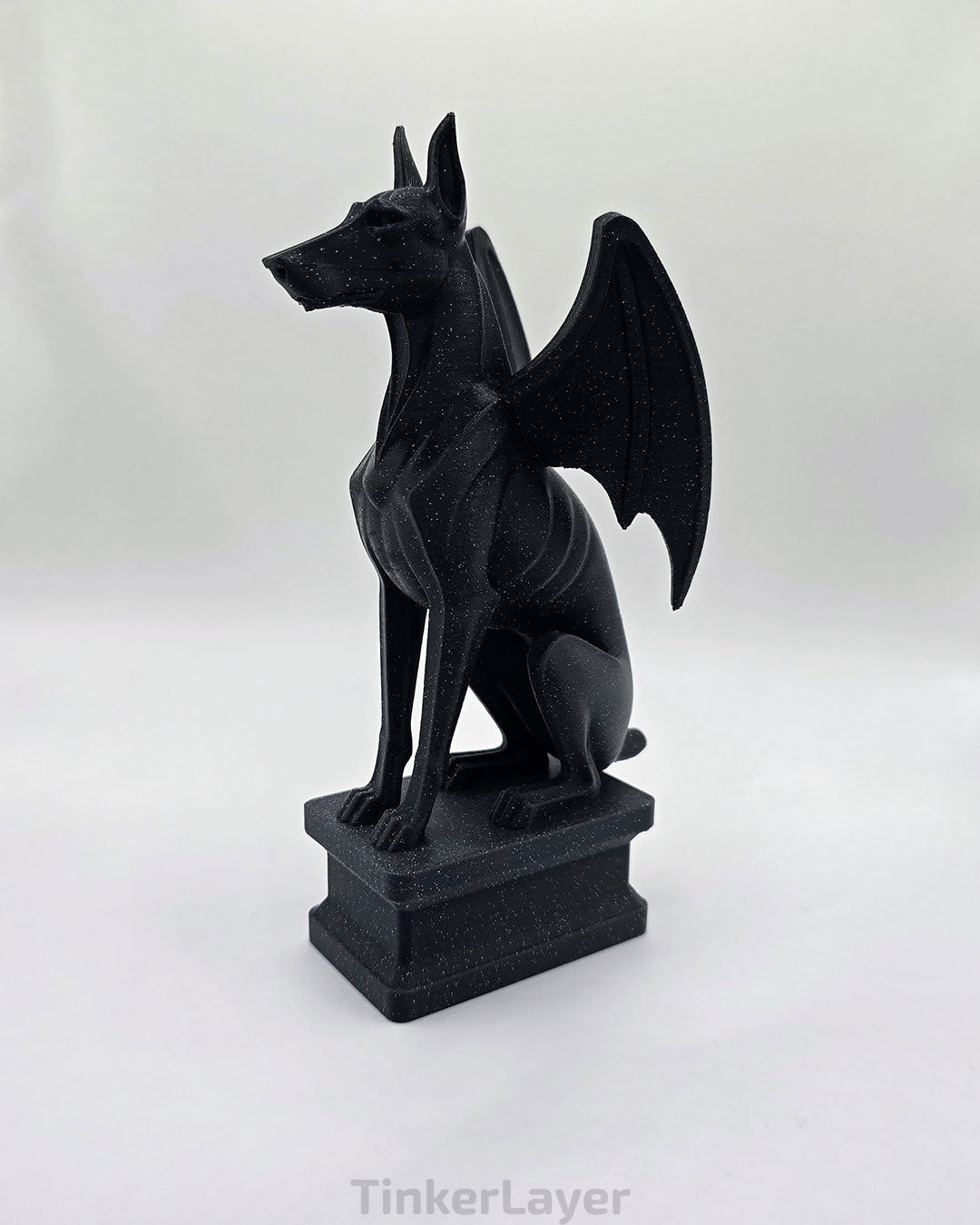 Side view of a gothic Doberman gargoyle statue printed in black and gray shimmer gradient PLA