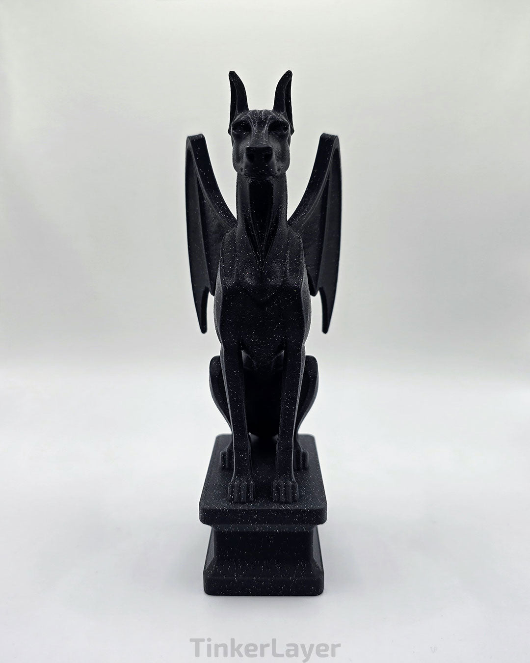 Front view of a gothic Doberman gargoyle statue printed in black and gray shimmer gradient PLA