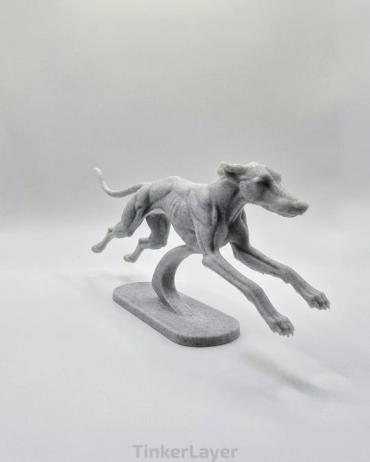 Side view of running Whippet greyhound statue in marble PLA with modern curved display stand