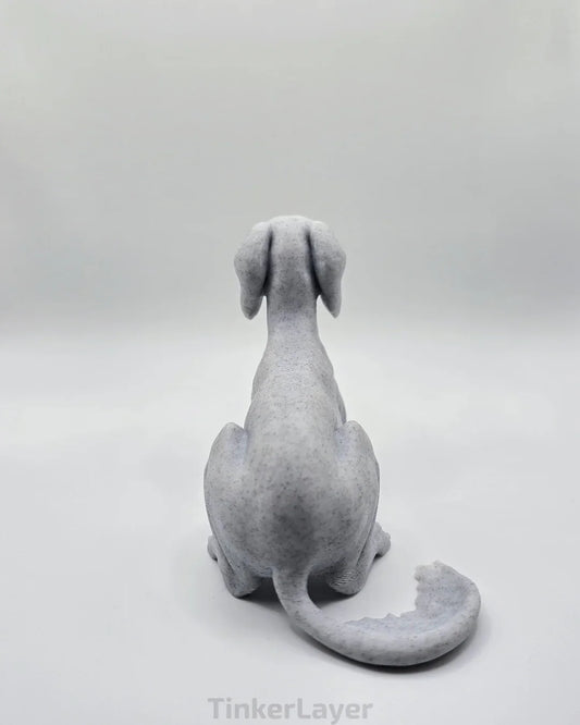 Rear view of laying Saluki statue in marble PLA