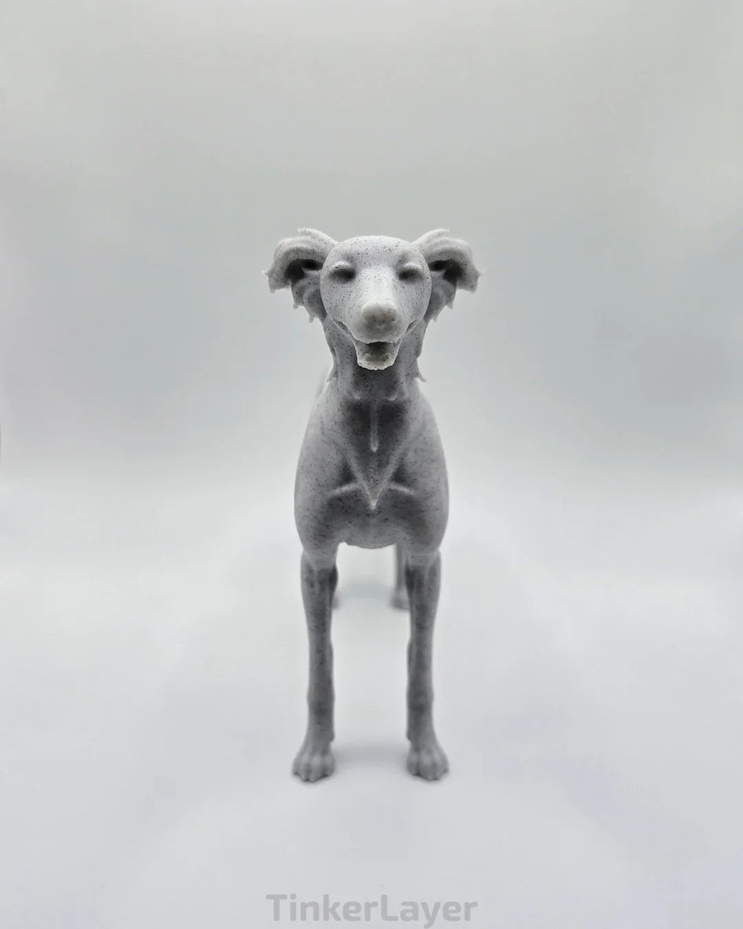 Front view of a standing Silken Windsprite statue in marble PLA