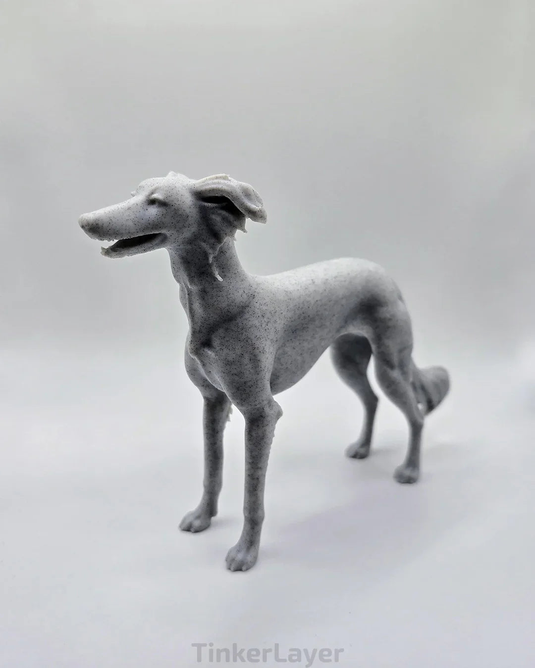 Side view of a standing Silken Windsprite statue in marble PLA