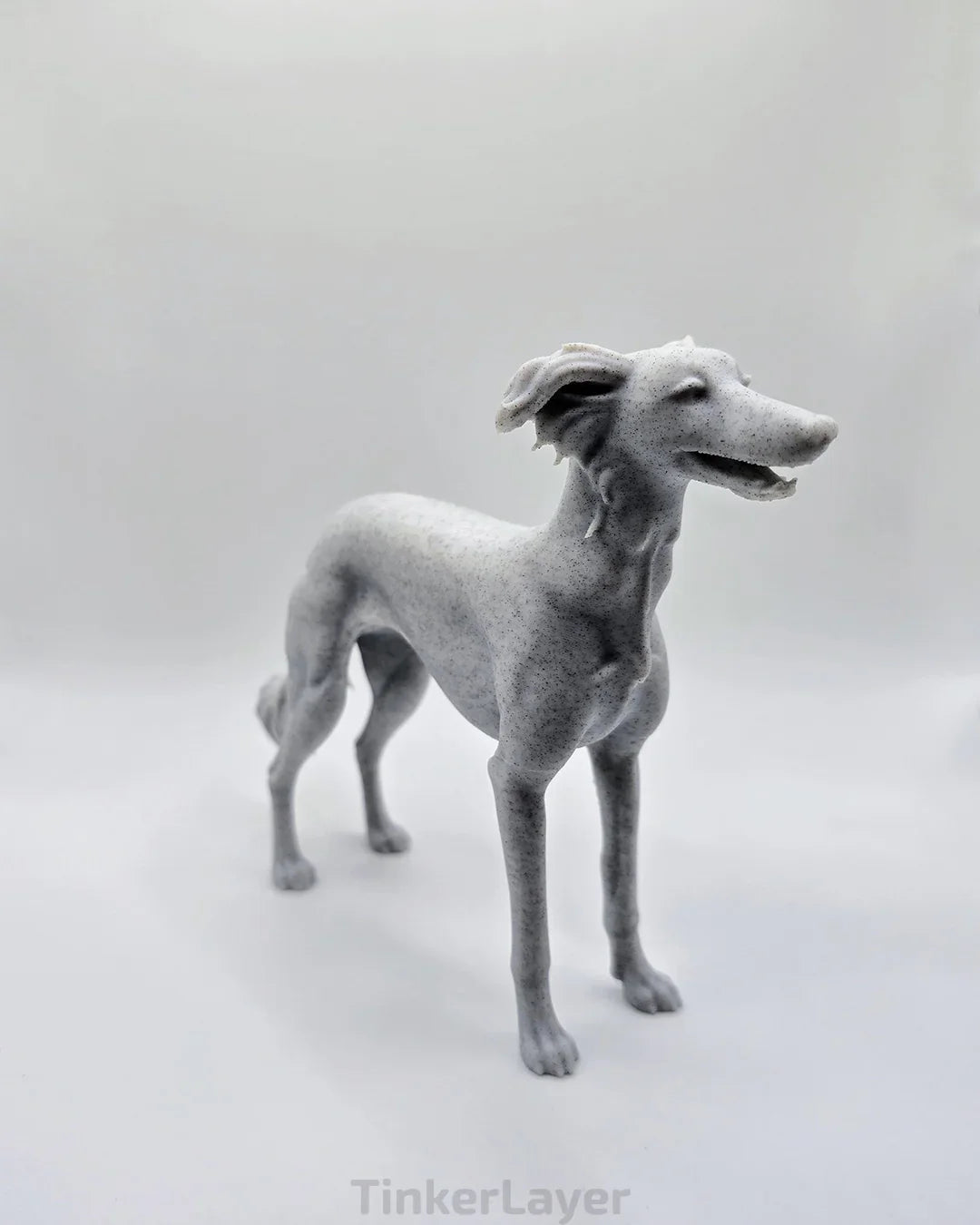 Side view of a standing Silken Windsprite statue in marble PLA