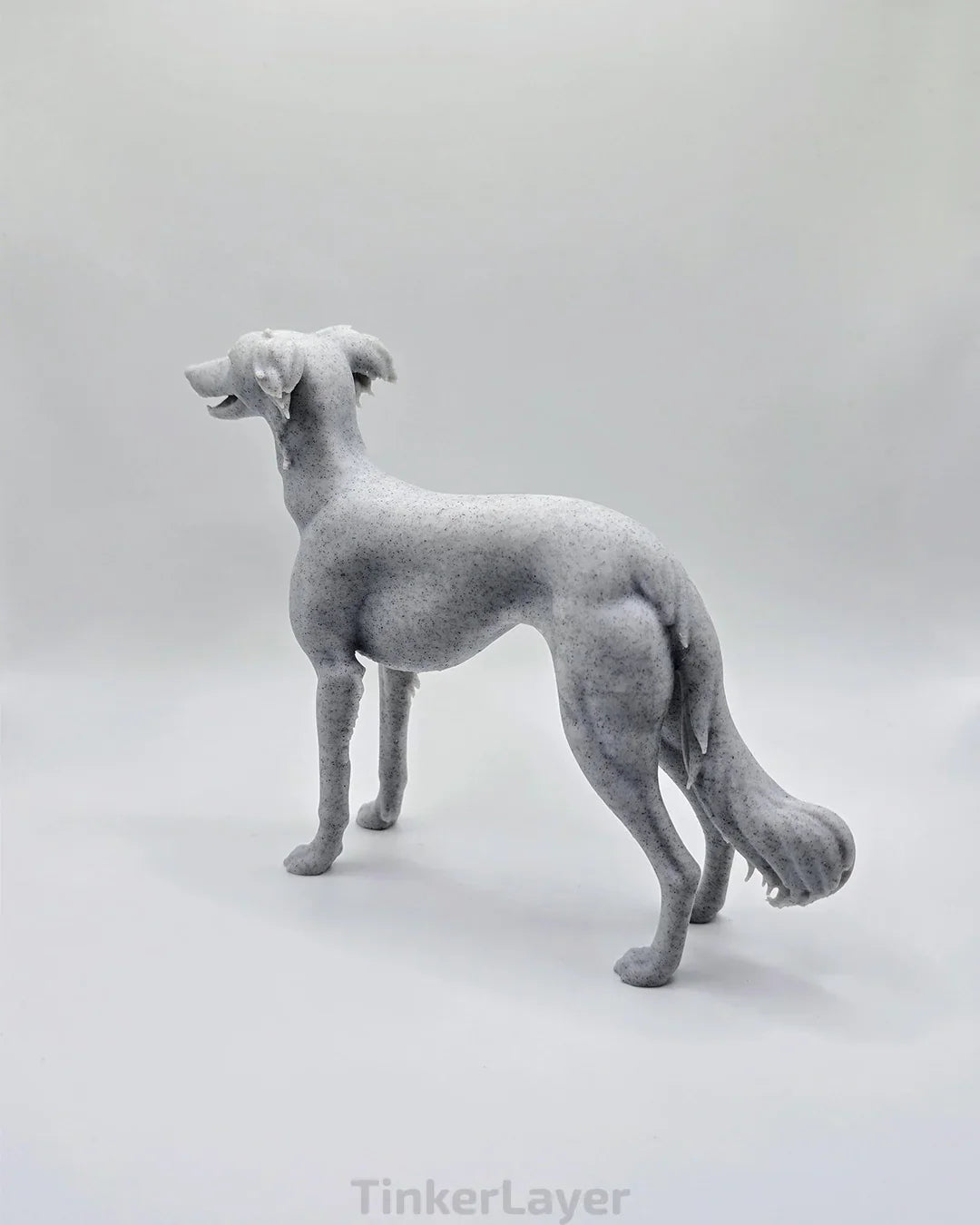 Side view of a standing Silken Windsprite statue in marble PLA