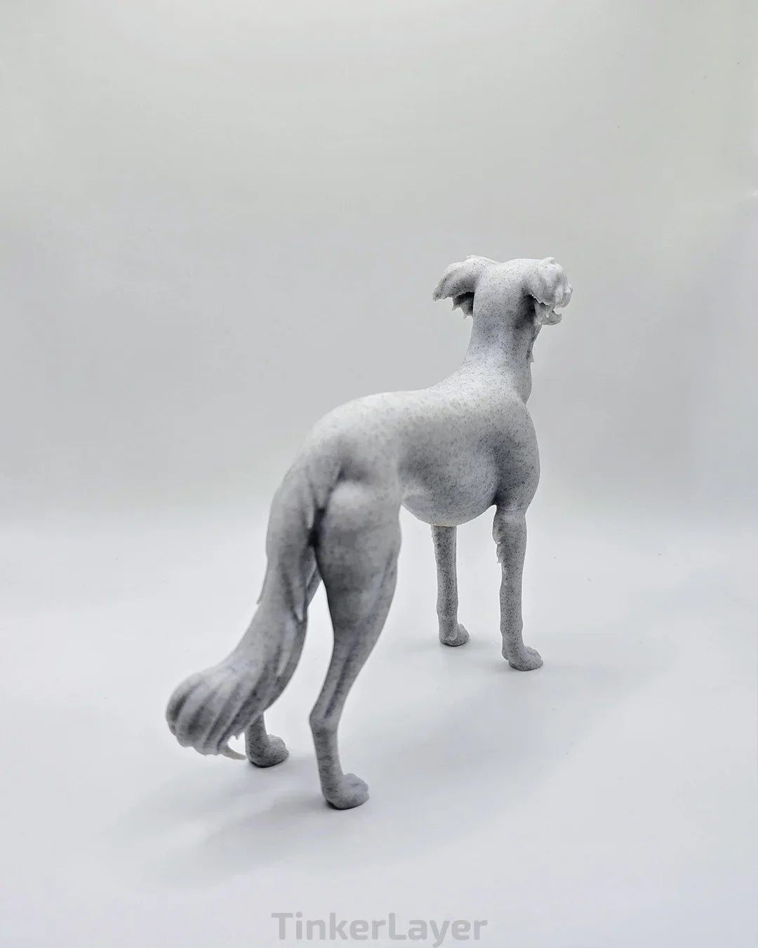 Side view of a standing Silken Windsprite statue in marble PLA
