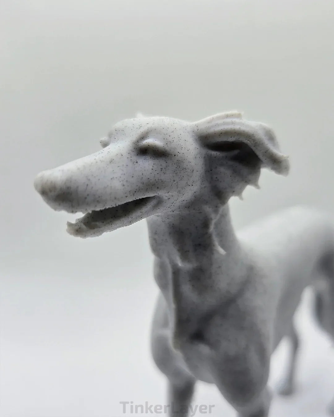 Side view of a standing Silken Windsprite statue in marble PLA