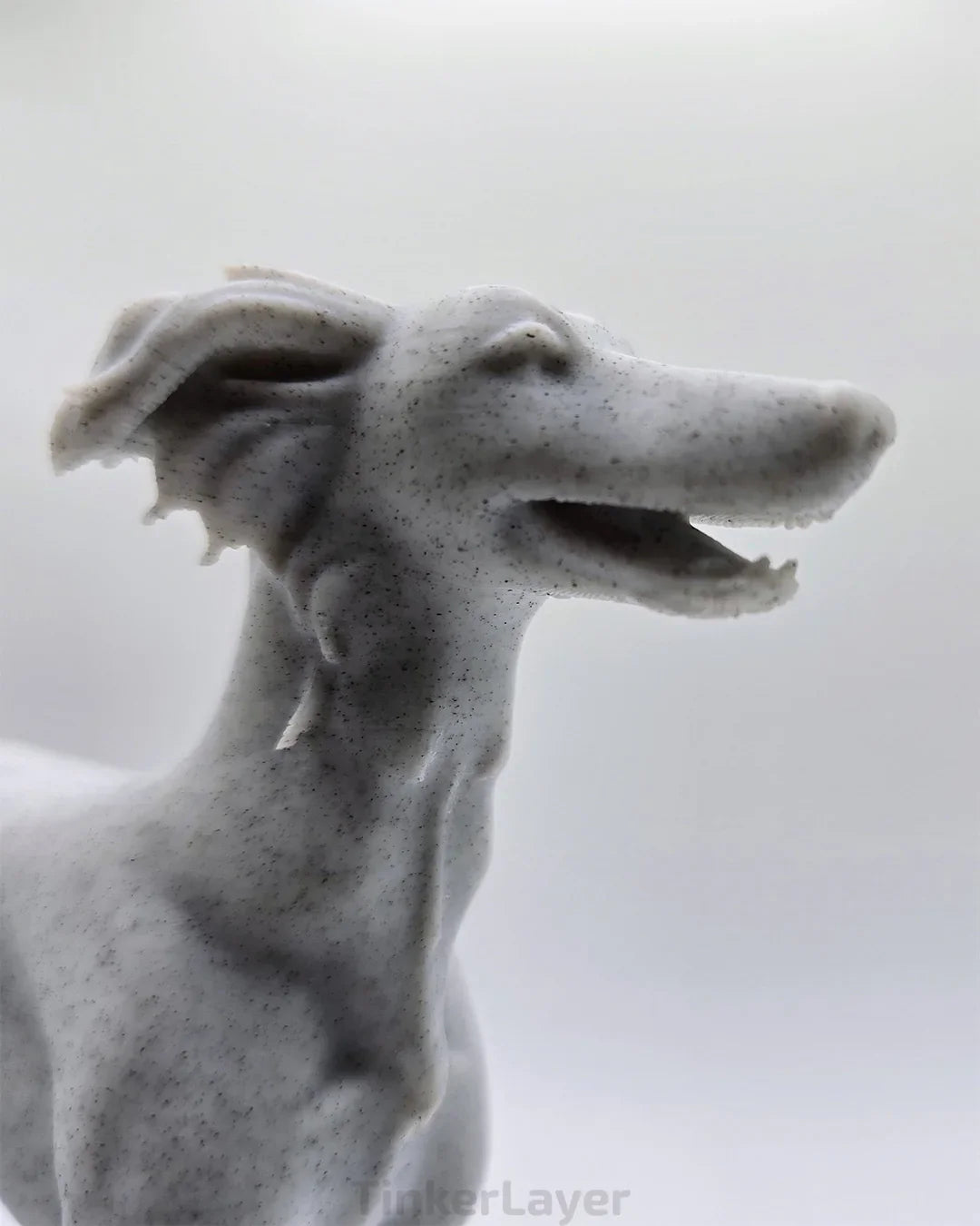 Side view of a standing Silken Windsprite statue in marble PLA