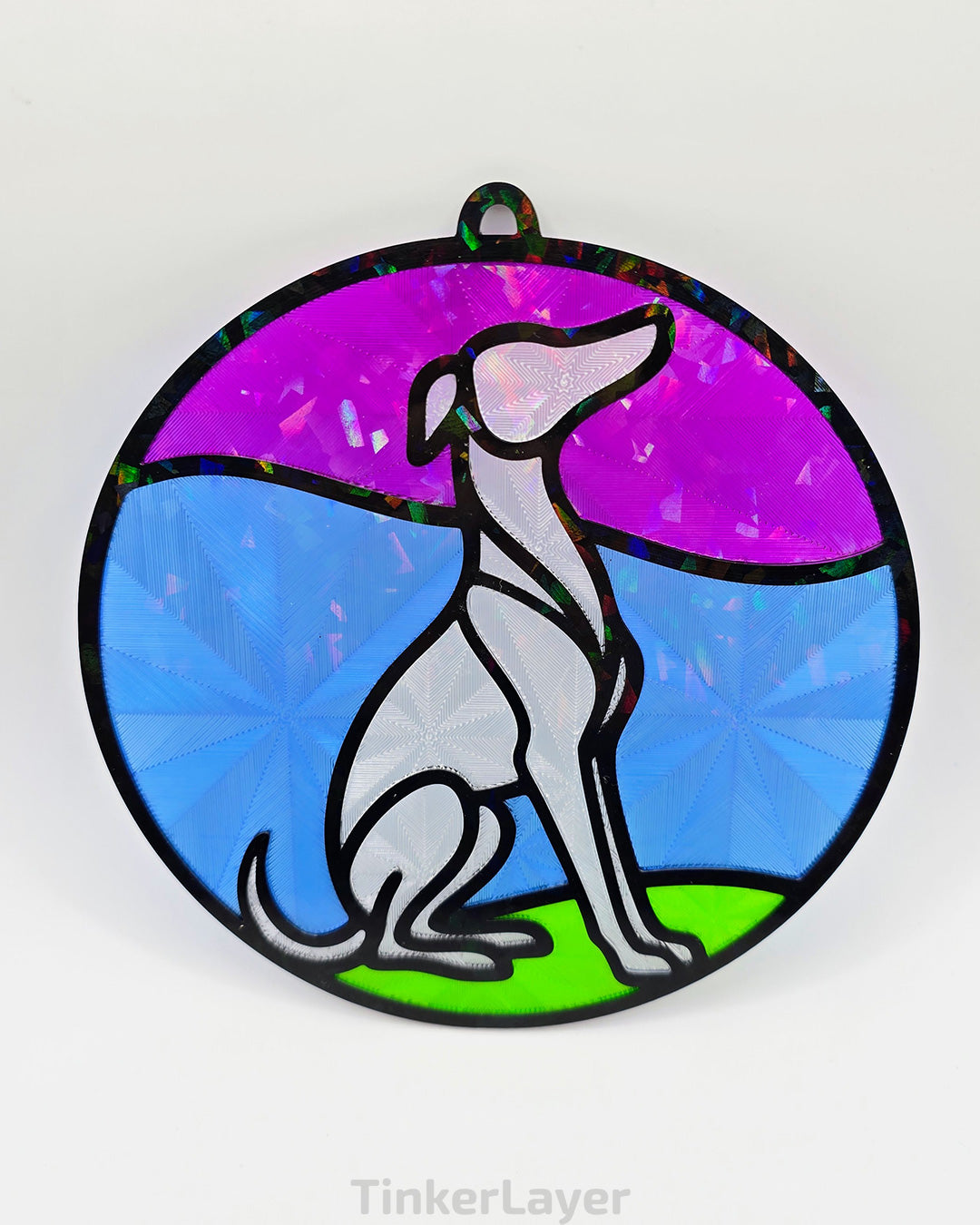 Round whippet stained glass style suncatcher with purple, blue, and green accents