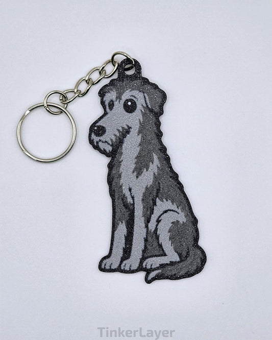 Chibi-style Irish Wolfhound keychain in gray and white on a white background